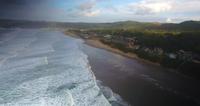 Aerial-drone-shot-of-seashore-overlooking-canon-beach-in-4k