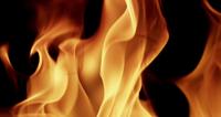 Extreme-close-up-to-fireplace-creating-random-design-in-4k-slow-motion