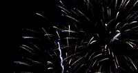 Big-group-of-spectacular-fireworks-glowing-in-night-sky-in-4k-slow-motion