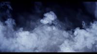 Controlled-smoke-creating-heavy-clouds-from-left-to-right-on-dark-background-in-4k