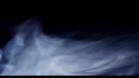 Soft-smoke-moving-slowly-in-lower-section-of-the-scene-with-dark-background-in-4k
