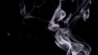 Mystical-thin-lines-of-controlled-white-smoke-drawing-white-swirls-in-4k