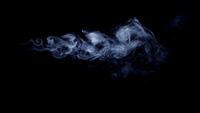 Fire-effect-created-by-white-smoke-moving-fast-in-black-scene-in-4k