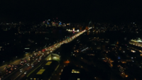 Traffic-on-harbor-bridge-at-night-4k