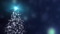 Snowflakes-star-lights-converge-into-the-christmas-tree-with-blue-bokeh-background