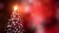 Snowflakes-star-lights-converge-into-the-christmas-tree-with-red-bokeh-background