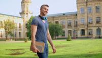 Handsome Student Walks on A Sunny Day