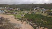 Aerial view of campsite, beach and houses at Jongensfontein