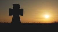 Silhouette of A Cross at Sunset