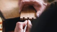 Joiner Carves a Dovetail Joint